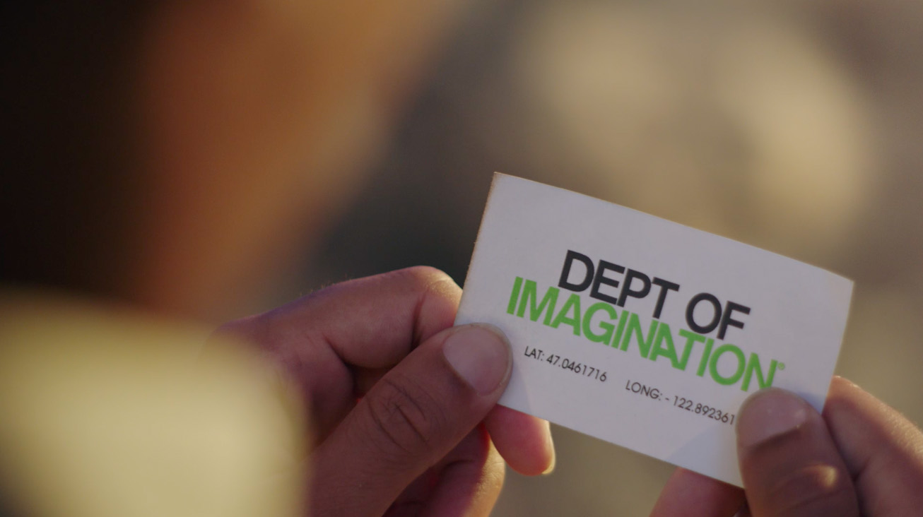 business card saying "department of imagination", the introduction to the whole spot